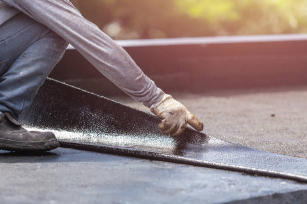 Professional Waterproofing technician working in Lobelville, TN
